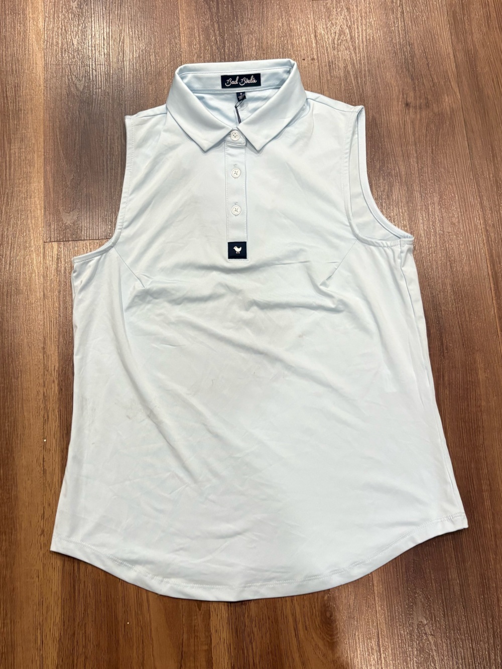 Bad birdie woman’s Light Blue Sleeveless Polo